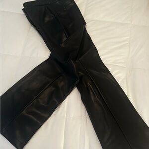 Black Leather high waisted, wide leg pant.